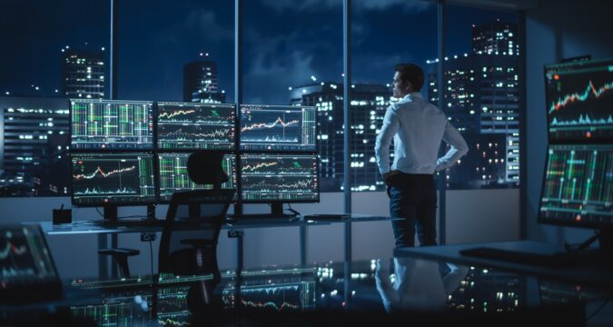 SuccessfulBusinessmanLookingOutOfTheWindowOnLateEvening | Cryptocoin Stock Exchange Ws-group.info Review, WS Group – Is WSGroup Scam or a Good Broker?